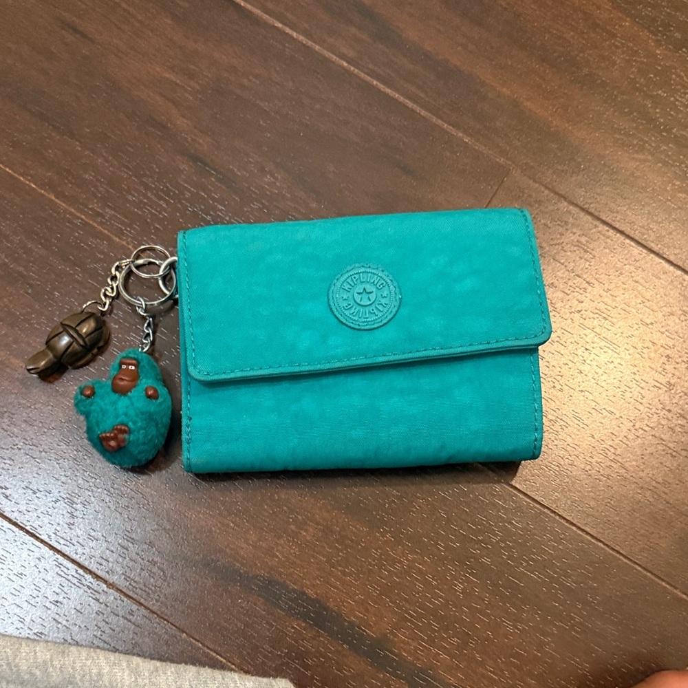 Kipling Teal Fold-Over Wallet with Monkey Charm